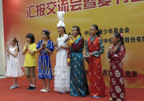 The China Children and Teenagers' Foundation (CCTF) launches a summer camp for children who have been practicing the altruistic spirit of Lei Feng at the China Women and Children's Museum in Beijing on July 31, 2013. [Women of China / Zhang Yuan]