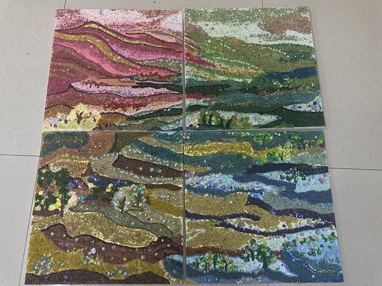 图为来自甘肃的牟小兰、陈雪、马玲珍、马晓轩、陈雪创作的藜麦画《布塄沟的美丽蝶变》。.jpg